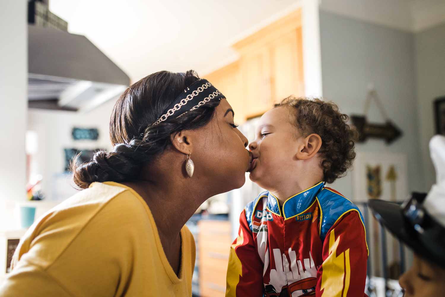 mother and son kissing on the mouth {San Francisco Family Photographer}