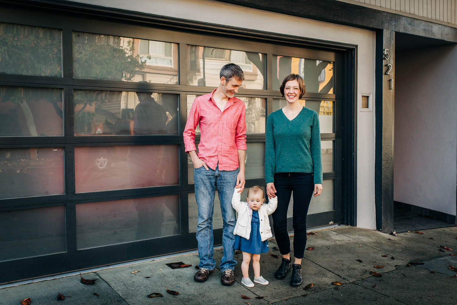 Family portrait in front of the garage door | Glen Park Family Photographer