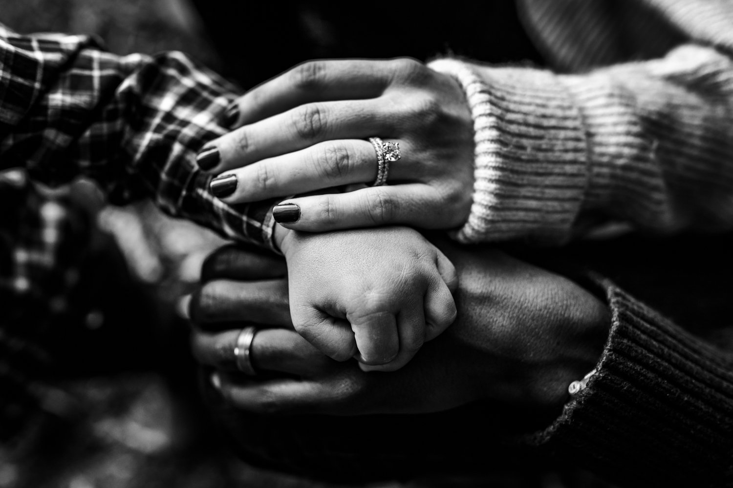 close up of family hands