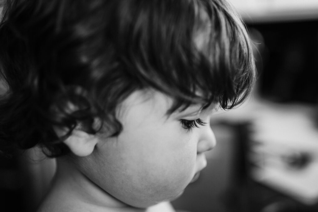 Profile of toddler with close up of eyelashes